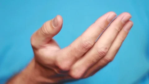 Calling up gesture closeup 스톡 동영상 75026236
