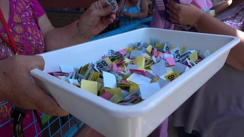 Calling lucky numbers at the raffle Stock Footage 88684519