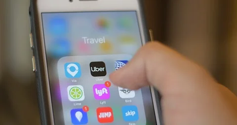 Calling Uber on iPhone Stock Footage 113285800