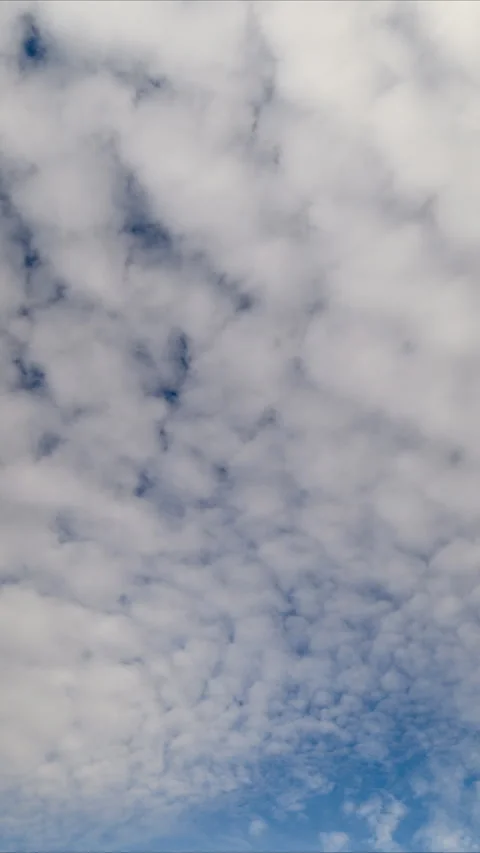 Calm aerial view showcasing drifting cloud patterns across horizon, Peaceful atm Stock Footage 325670947