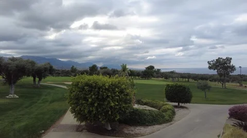 Calm and cloudy day at the golf course. Stock Footage 242149672