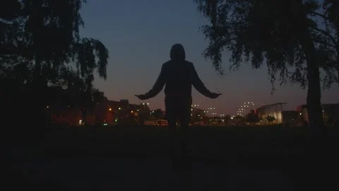 Calm and focused training session in park during peaceful twilight hours Stock Footage 325071587