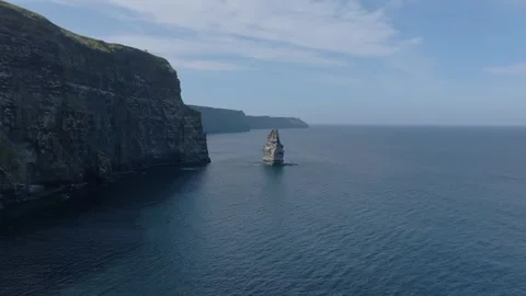 Calm Atlantic Sea Stack Below Cliffs of Moher, Ireland Drone Flyover Stock Footage 341019810