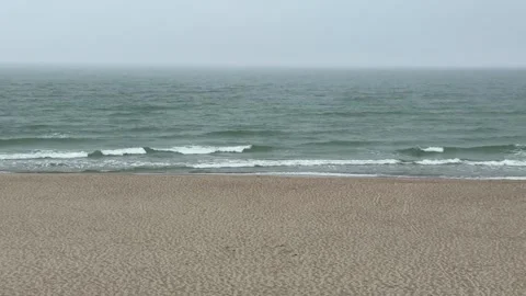 Calm Baltic Sea Waves Rolling Toward Empty Sandy Beach Video stock 311130464