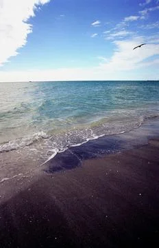 Calm beach with waves 스톡 사진