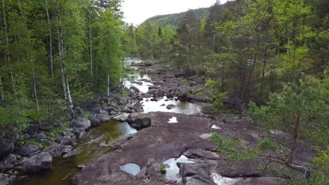 Calm Beautiful River with Trees and Smooth Rocks - Grovane, Norway - 2.7K Aerial Stock-Footage 258290032