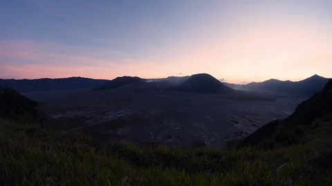 Calm beautiful sunset over Mount Bromo located in Java, Indonesia Stock Footage 86226625