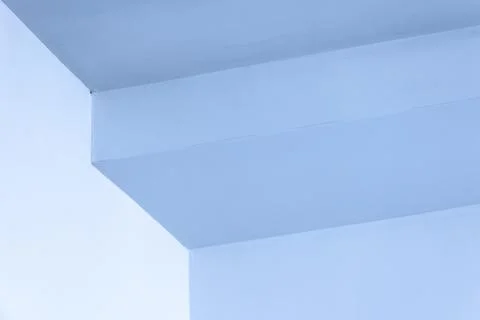A calm blue interior corner with sharp angles and soft light Stock Illustration
