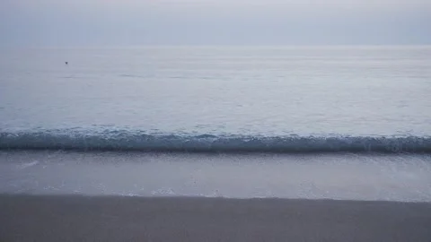 Calm blue sea waves on the sandy beach. Stock Footage 149690658