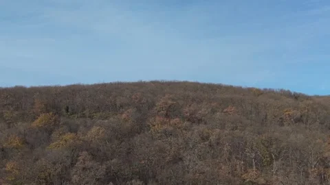 Calm Blue Sky Above Rolling Hills at Dawn Aerial View Stock Footage 324889952