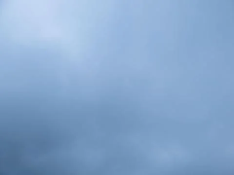 Calm blue sky texture with soft clouds, atmospheric haze and copy space 스톡 사진