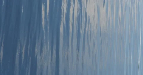 Calm blue water surface waves vertical Stock Footage 205831986
