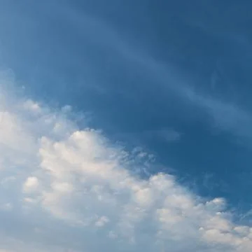 Calm cloud sky scape at dawn background Stock Photos