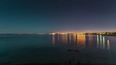 Calm Coastal Water Under Starry Sky in Raa, Sweden Stock Footage 342054634