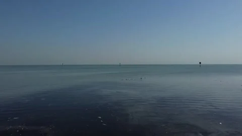 Calm Coastal Waters and Open Sea in Saudi Arabia Stock Footage 334745370