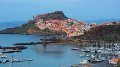 Calm evening cityscape of Castelsardo port, Sardinia island,  Italy. Stock Footage