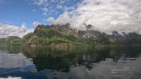 Calm fjord with dramatic mountain mirror reflection in Lofoten Video stock 344453464