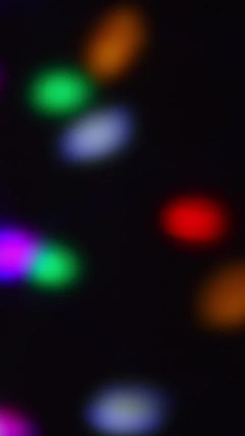 Calm Flashing Colored Bokeh Lights in Slow Rhythm at Night 스톡 동영상 340322391