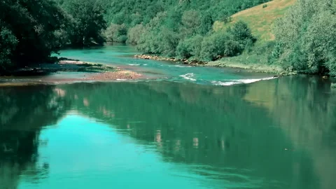 Calm flow of big green mountain river Stock Footage 140435293