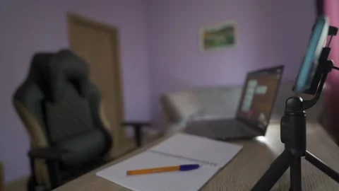 Calm Home Office Setup with Laptop and Smartphone for Video Recording | HLG Stock Footage 312869760