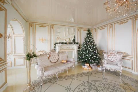 Calm image of interior Classic New Year Tree decorated in a room with fireplace Stock Photos