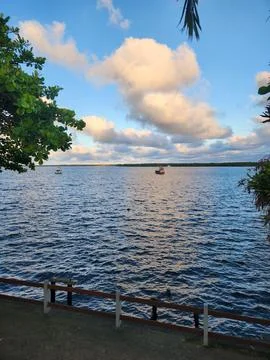 Calm lagoon at dusk Stock Photos