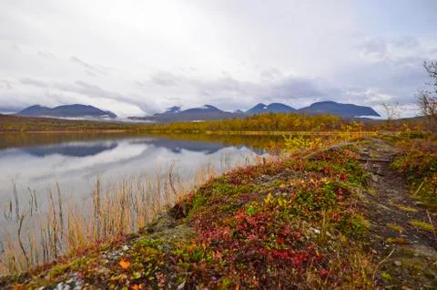 Calm lake reflection Stock Photos