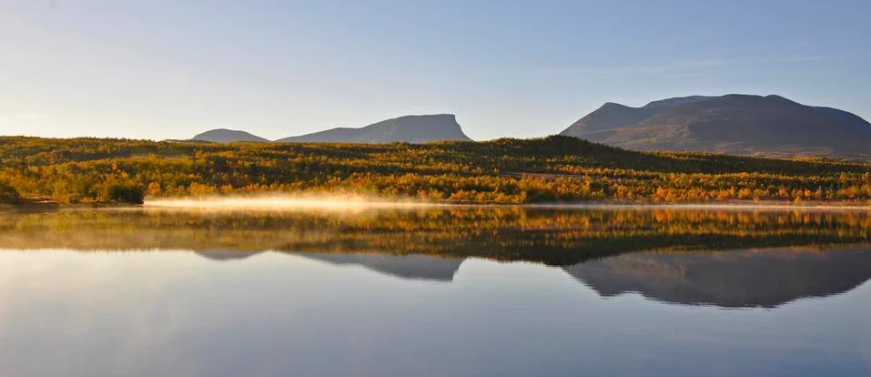 Calm lake reflection Stock Photos