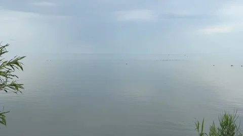 Calm lake with sky reflection Video stock 320948899