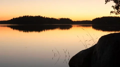 Calm lake sunset timelapse Stock Footage 56190395
