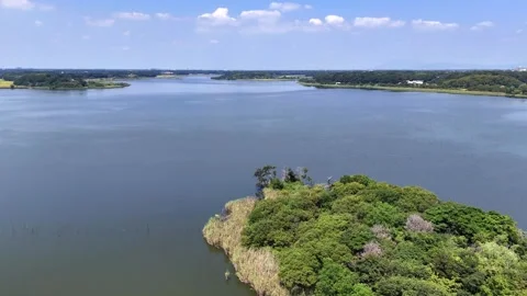 Calm Lake Surface | Blue Sky | Reflection | Summer Landscape Stock Footage 328898385