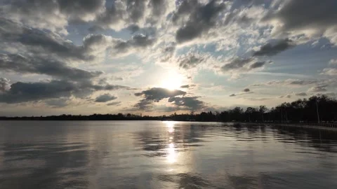 A calm lake surface with sunset. Stock Footage 317628921