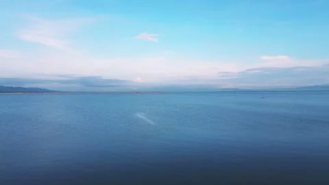 Calm lakescape Under Blue Sky Stock Footage 304281763