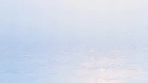 Calm Light Waters: A Soft, Reflected Sun on an Abstract Water Surface, Ideal fo Stock Footage 318052174