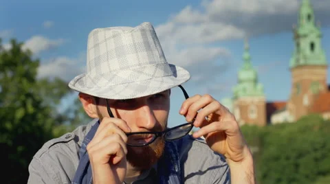 Calm man looking around and thinking about something  Stock-Footage 67544740