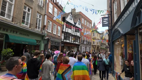 Calm marching through the old city centre at Cambridge Pride 2026 Stock Footage 338017344