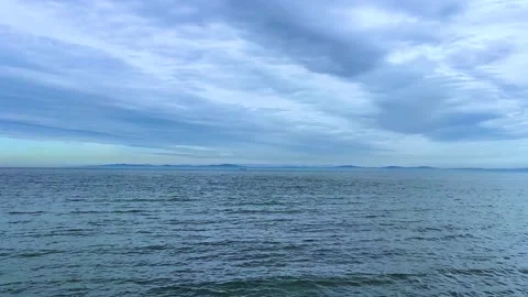 Calm Marmara Sea Waves under Dramatic Blue Sky - Peaceful Ocean Horizon Back Stock Footage 328613730