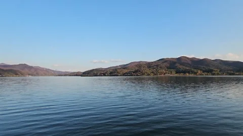 Calm Mountain Landscape Reflected on a Quiet River in Korea Vídeos de archivo 330175312