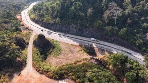 Calm Mountain Road Through Dense Forest Stock Footage 327508622