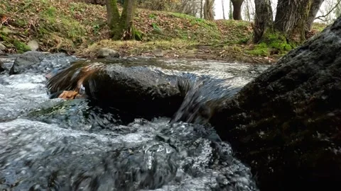 Calm Mountain Stream Flowing Over Rocks – 4K 60fps Video stock 325122593