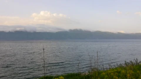 Calm Ocean With Clouds at Dusk Stock Footage 53202945