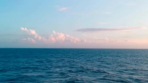 Calm Ocean Horizon with Clouds and Blue Sky 4K Stock Footage 339506273