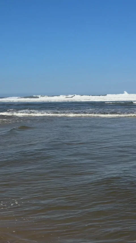 Calm ocean ripples fold continuously over the water's surface. Waves washing on Stock Footage 340318315