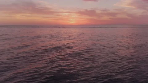 Calm Ocean Sunset Aerial Drone View Close To Water Golden Hour Stock-Footage 148250737