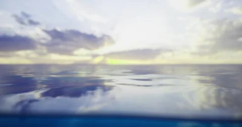 Calm ocean surface reflecting clouds during sunset in serene atmosphere 스톡 일러스트