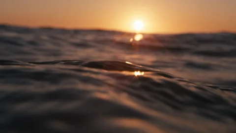 Calm ocean surface at sunset in close focus Stock Footage 117641835