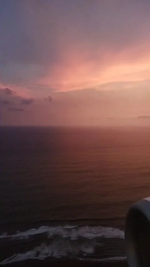 Calm Ocean Surface at Sunset Seen from Above Stock Footage 324728394