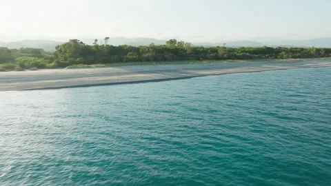 Calm ocean of tropical beach under cloudy sky. Stock Footage 282079871