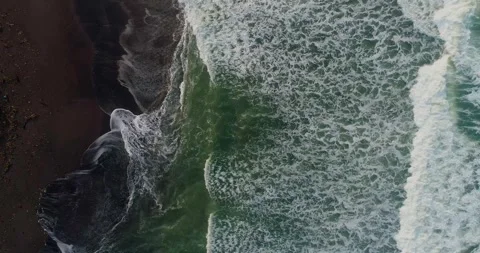 Calm Ocean Waves Approaching Shoreline in Soft Morning Light Stock Footage 332150714