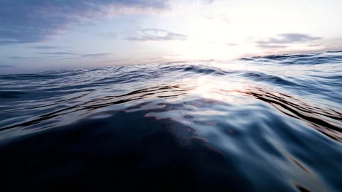 Calm ocean waves during sunset. Endless loop Stock Footage 347882522
